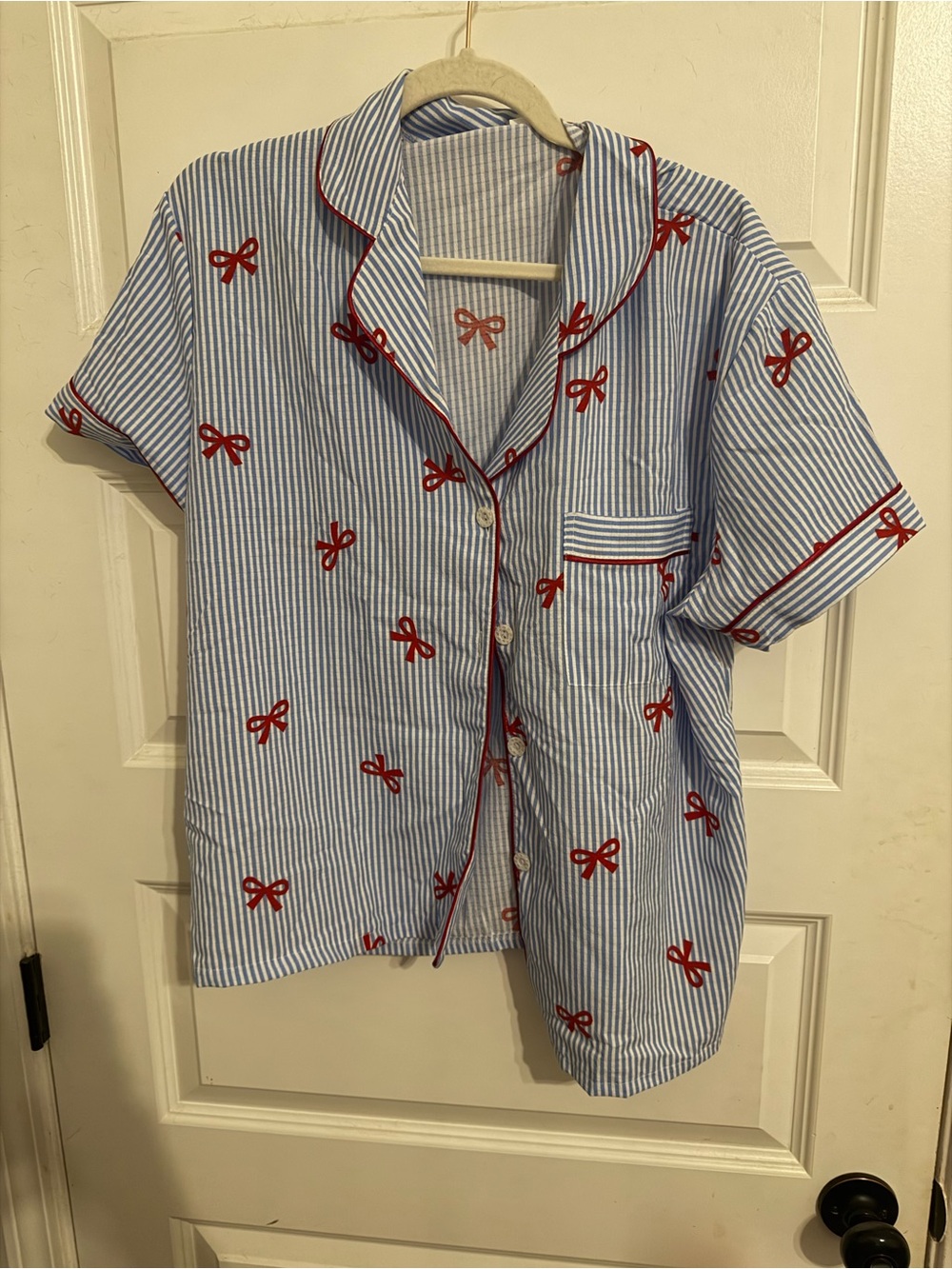 Striped Blue Button-Up Top with Red Bow Print